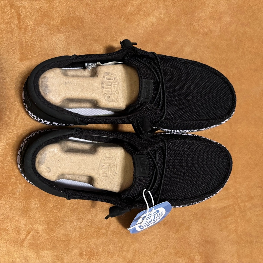 Women’s Hey Dude Black and White Casual Shoes